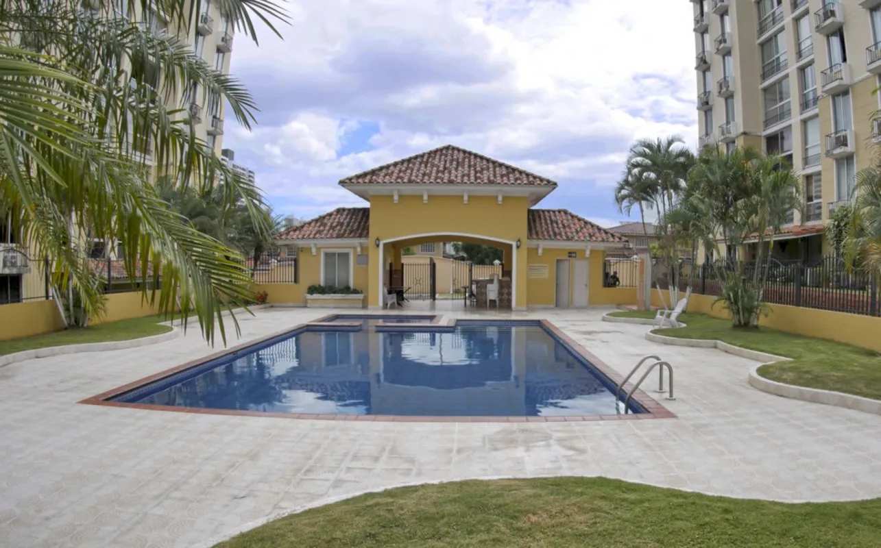 Swimming pool with sun deck and lounge area PH Altamira Residences Condado del Rey