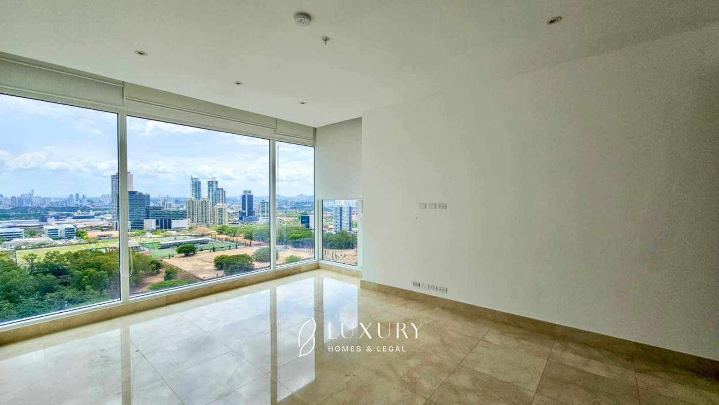 Modern bathroom with marble walls, glass shower and granite double sink vanity PH Aria Panama