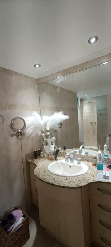 Spacious open-plan living dining room with balcony access skyline views PH Oceanaire Panama