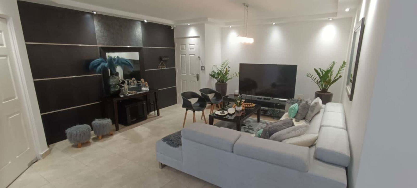 Modern kitchen with granite countertops wooden cabinetry appliances PH Oceanaire Punta Pacifica Panama