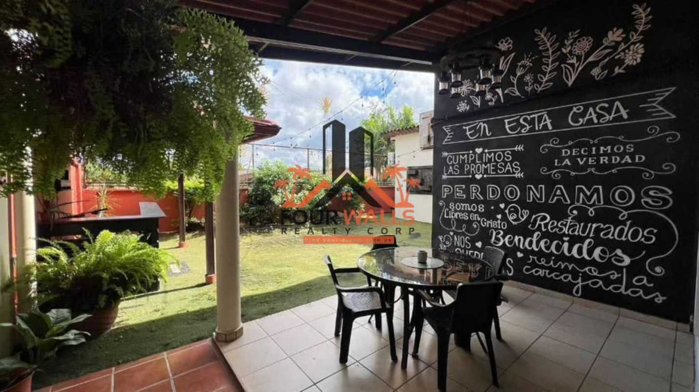 Modern kitchen with tile floors and cabinetry in house for sale in Brisas del Golf Panama