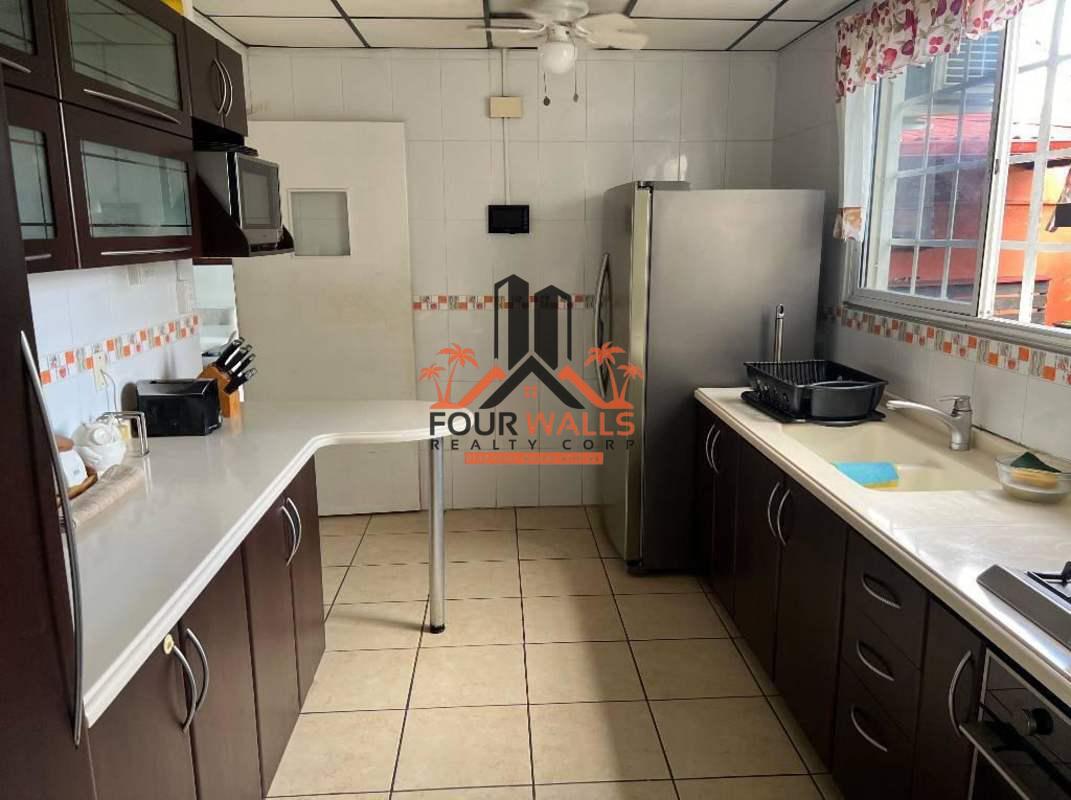 Open living dining room with ceramic floors in house for sale Brisas del Golf Panama