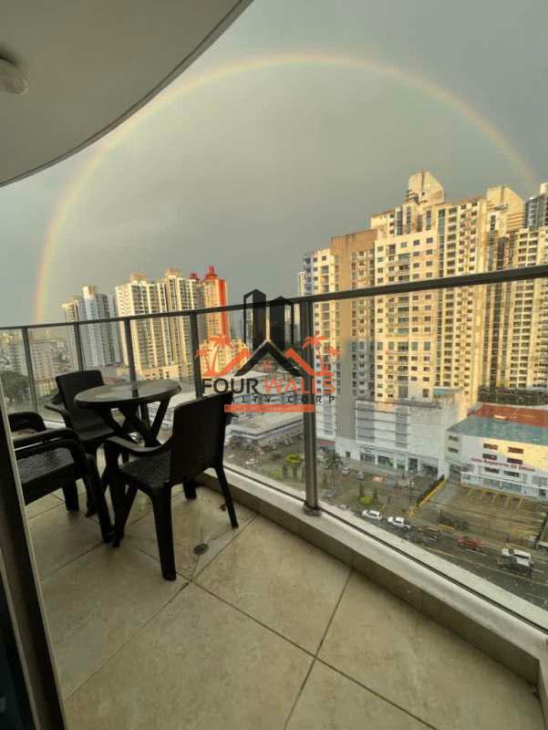 Living room with ceramic floors, natural light, balcony access at PH San Roque Via España Panama City