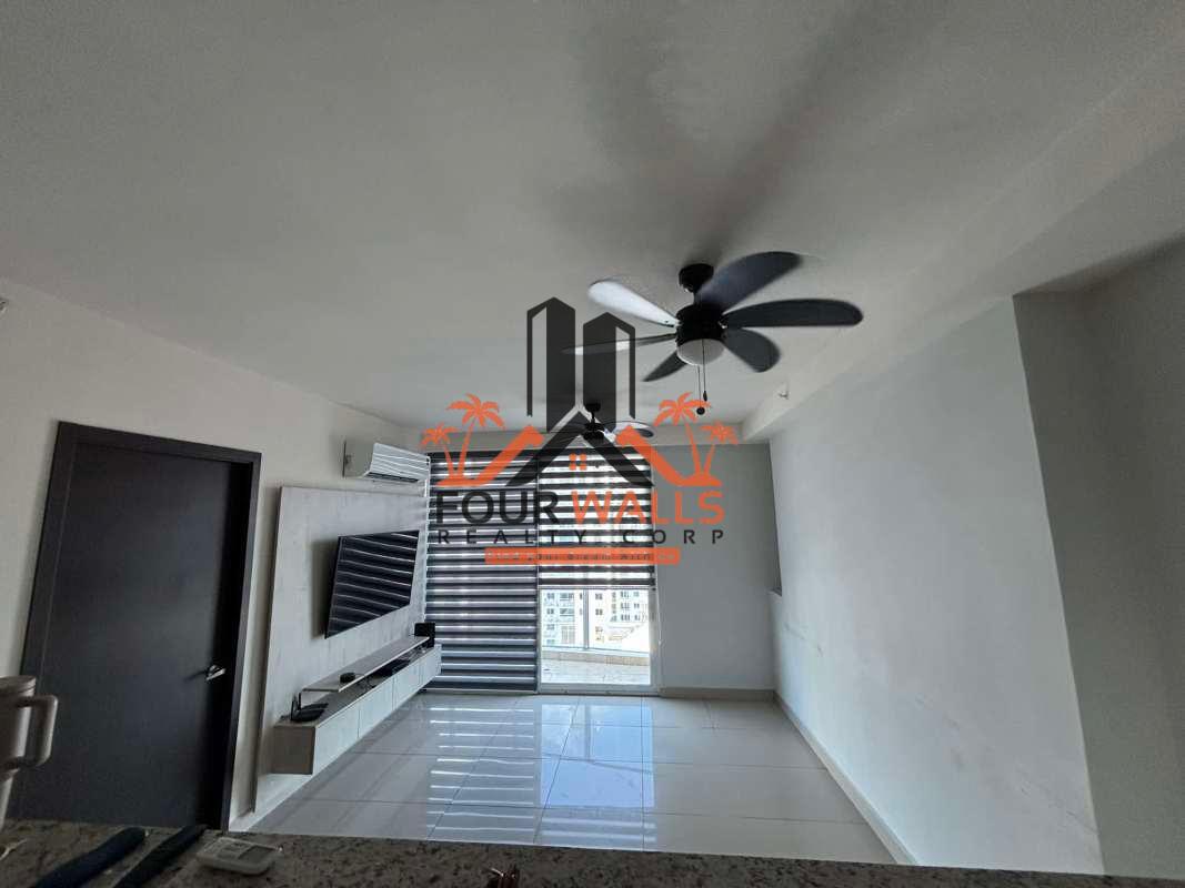 Open kitchen with granite countertop in modern apartment at PH San Roque Via España Panama City