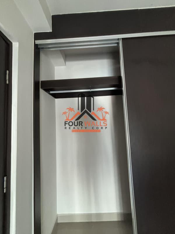 Outdoor swimming pool with lounge chairs in PH San Roque Via España Panama City