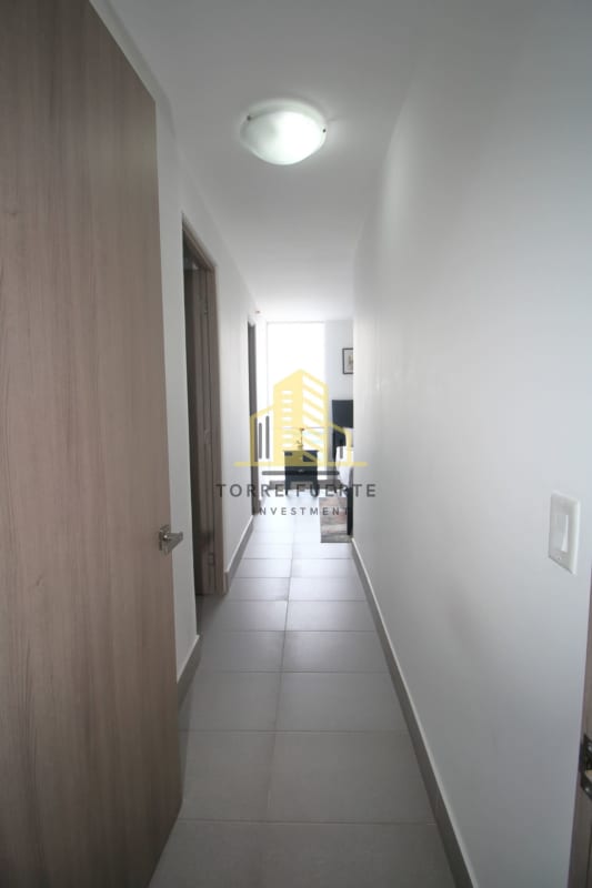 Bedroom with natural light, large window, ensuite bath in PH Loma Vista Tower