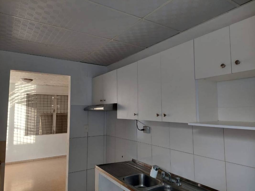 Kitchen with cabinets and window in house for rent Campo Limbergh Panama