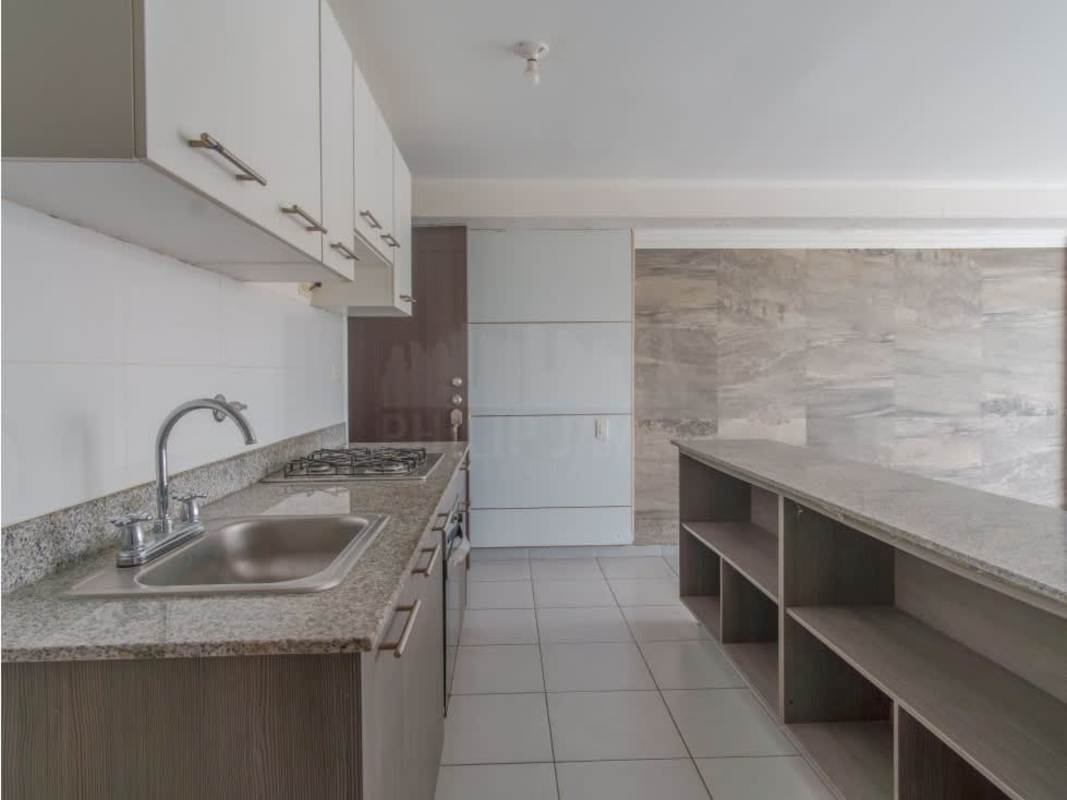 Apartment kitchen with granite countertops and built-in stove PH Aviñon Tower Panama City