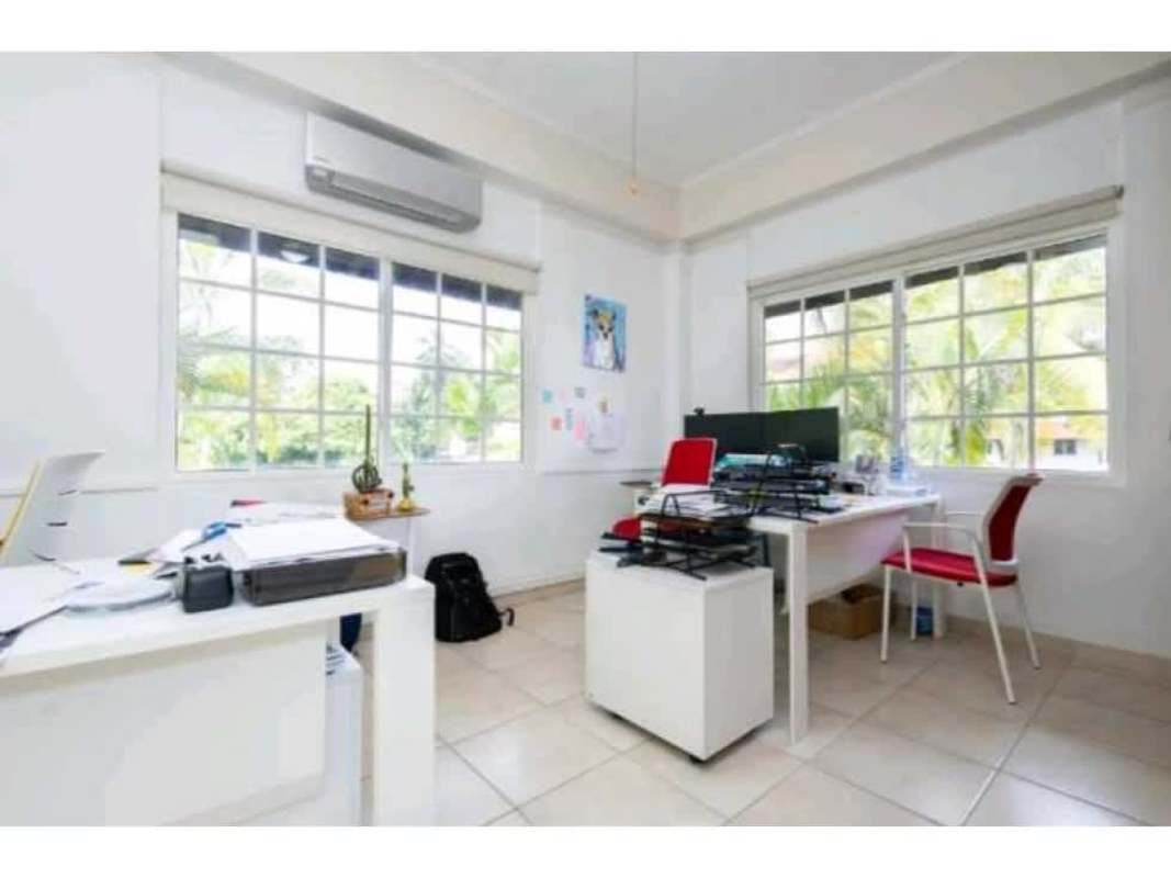 Large windows bright minimalist office in diplomatic mansion Albrook Panama