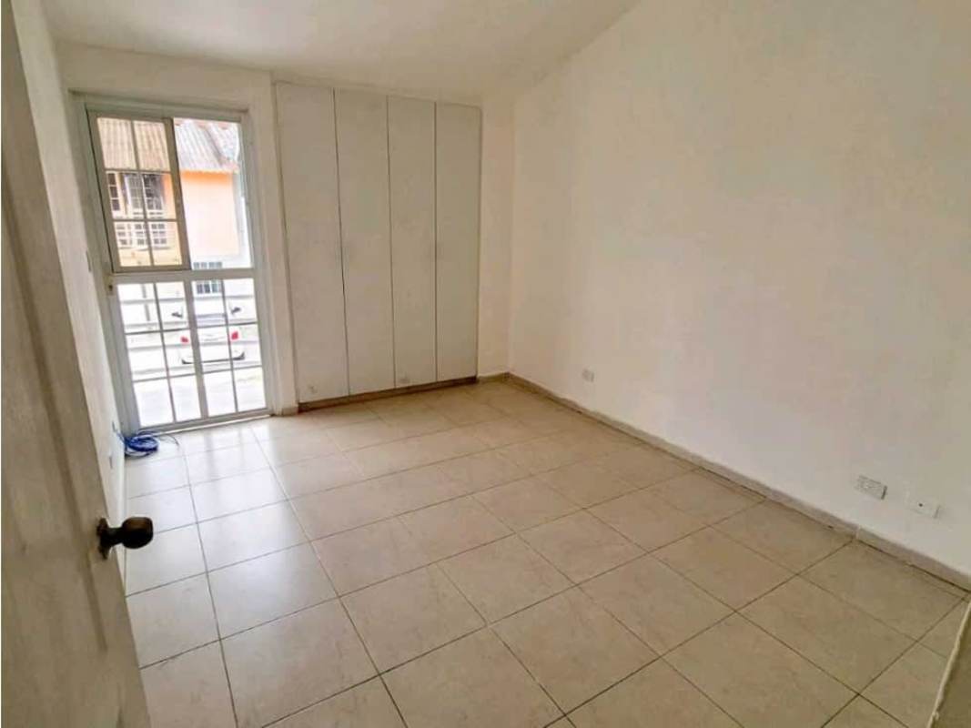 Bedroom with large window and tile floors PH Villas del Naranjal Pedregal Panama home for sale