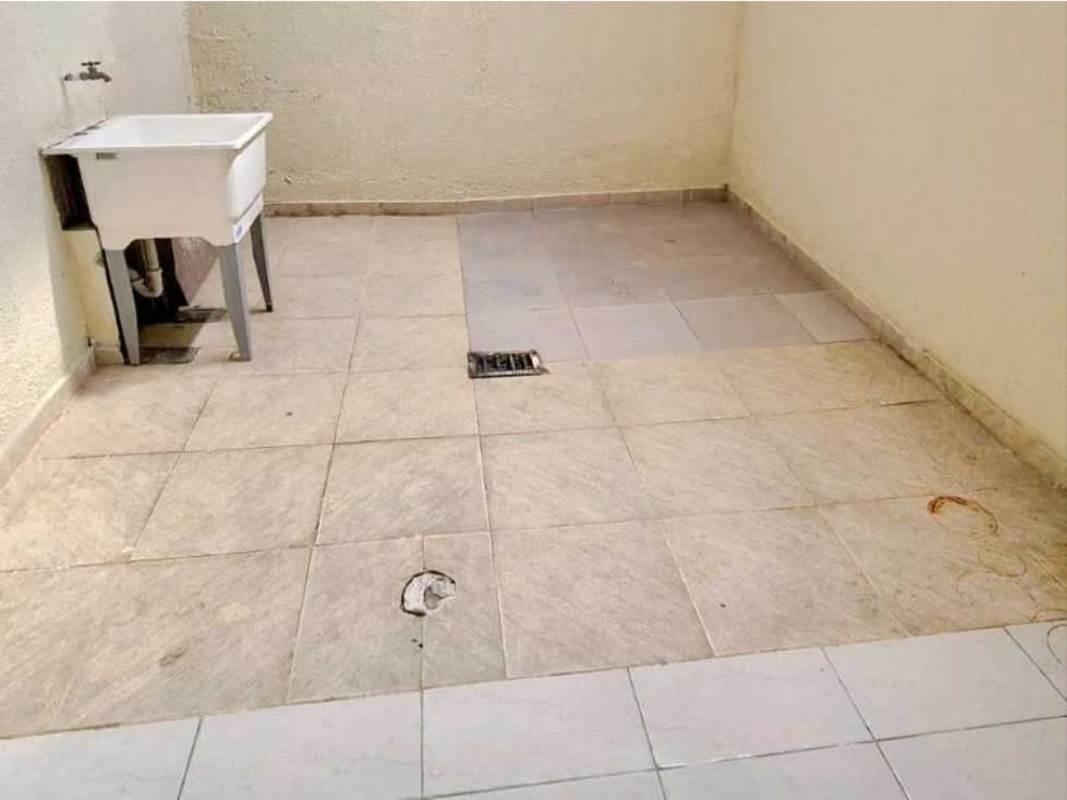 Basic laundry utility sink with tile wall PH Villas del Naranjal Pedregal Panama