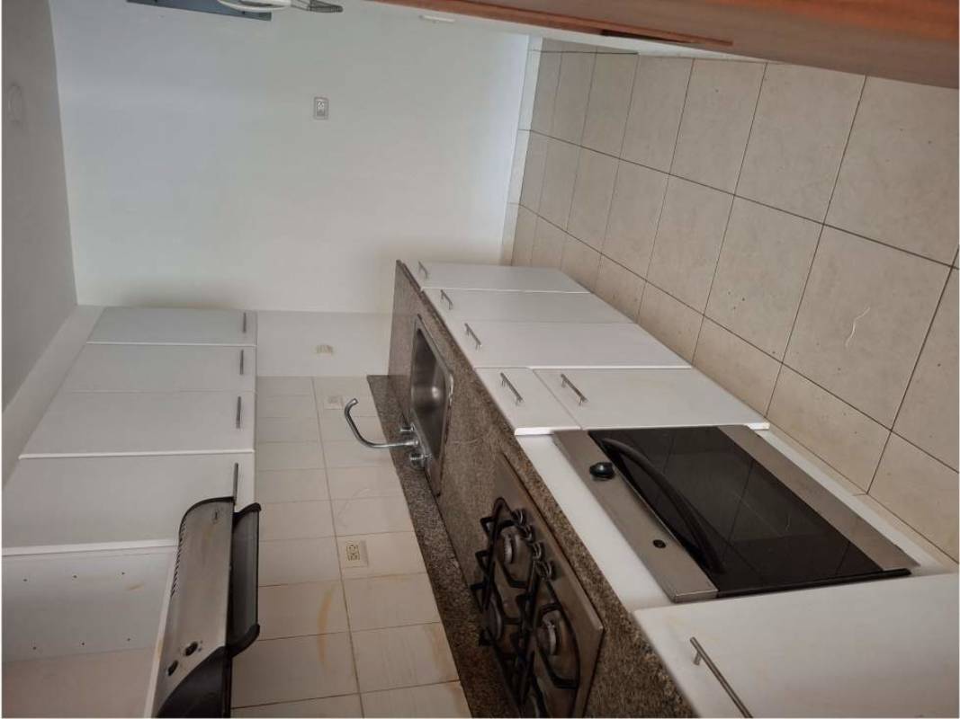 Kitchen area with granite countertop, gas stove and oven in PH Altavista Tower Don Bosco Panama