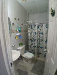 Open plan living room with dining area, tile floors Barriada La Cresta house