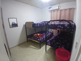 Bedroom with AC, tile floor, bunk beds in Barriada La Cresta Colón Panama