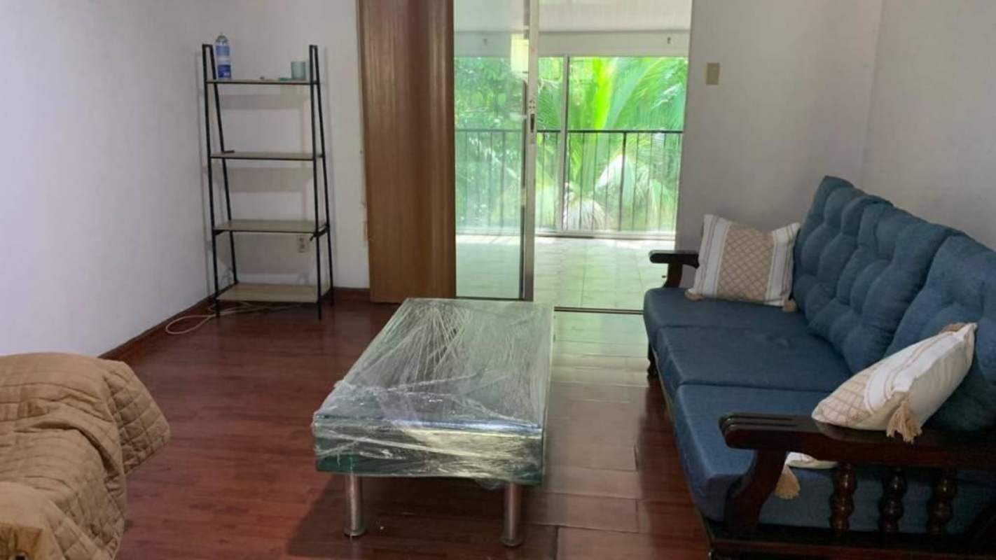 Dining area with large windows and wooden furniture garden views Clayton Panama