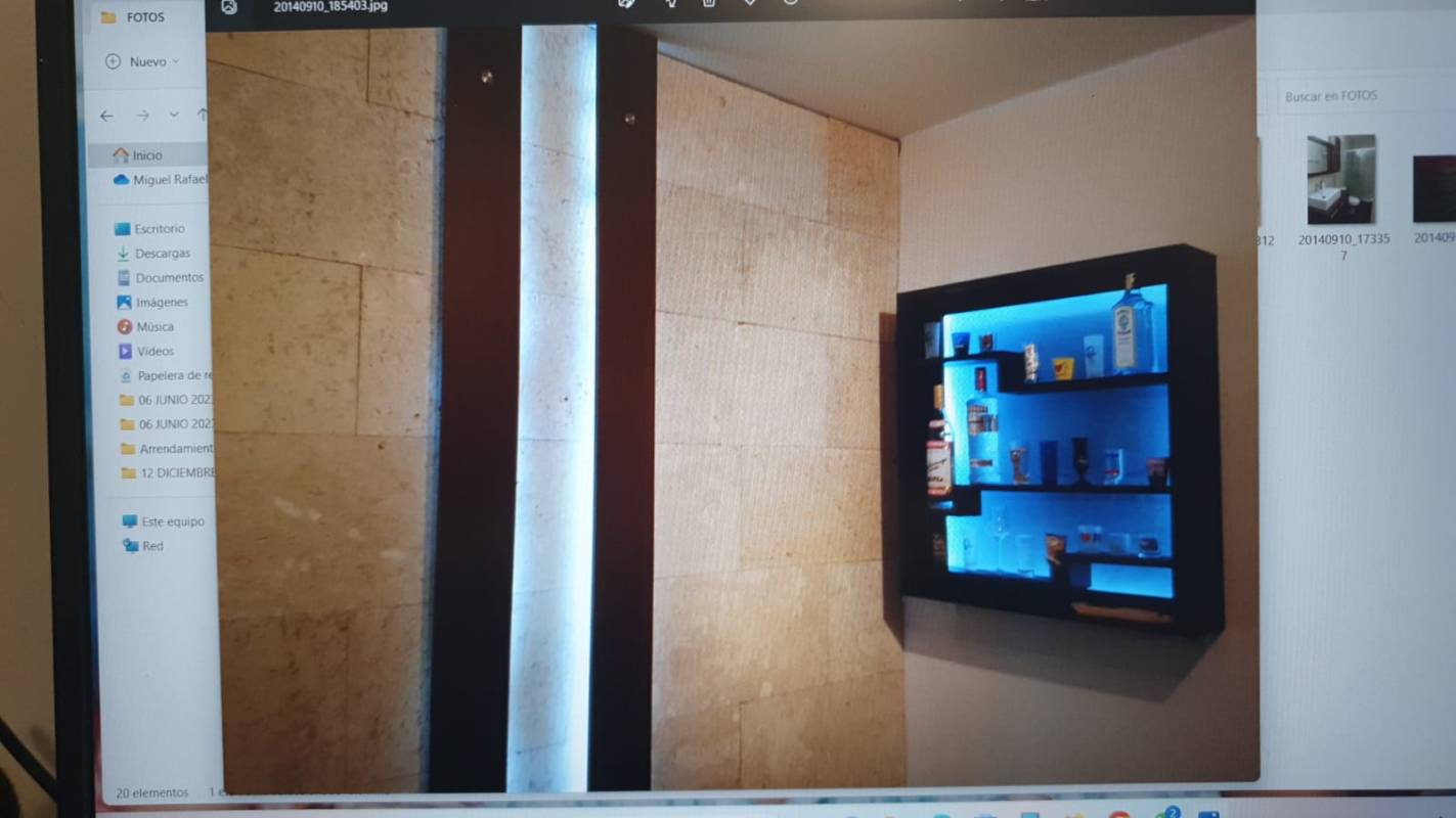 Practical kitchen with wooden cabinetry, tile counters, laundry corner in PH Majestic Garden Edison Park