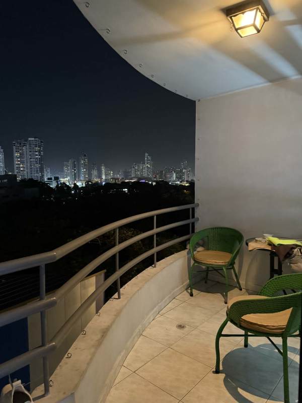 Night skyline city view from balcony with seating at PH Mirabel Punta Paitilla Panama