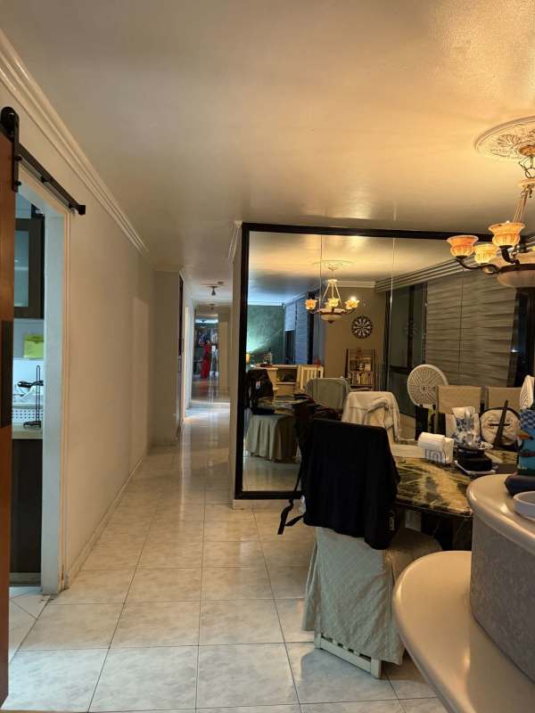 Secondary bedroom with window, AC unit, and closet PH Mirabel Punta Paitilla Panama