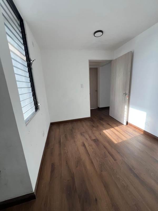 Kitchen with granite countertop, white tile backsplash, wooden cabinetry PH Dorasol Panama