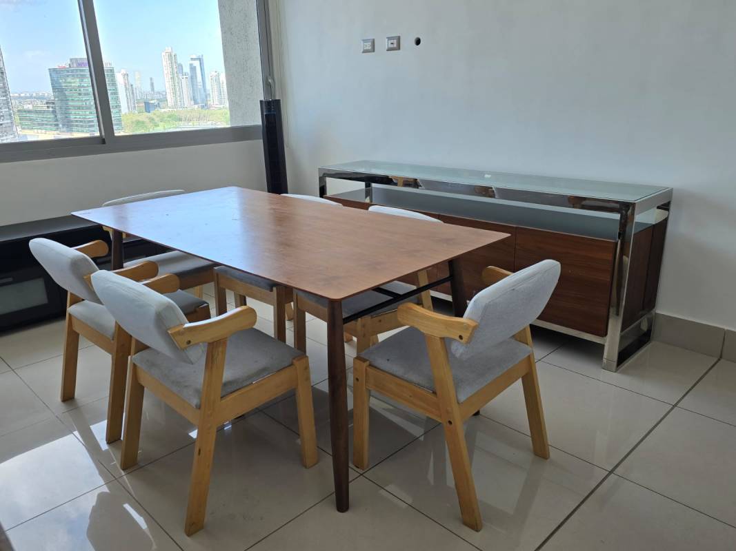 Dining area with large windows overlooking skyline at PH Bali Panama