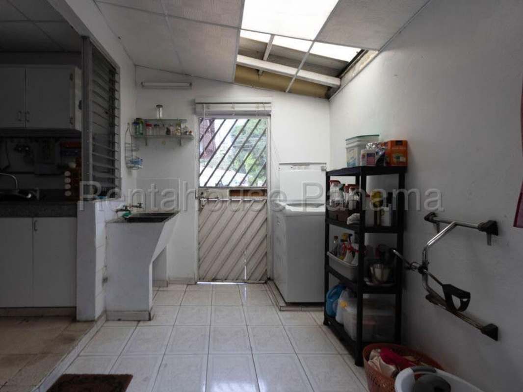 Private pool with tiled patio in corner lot house Villa Lucre Panama