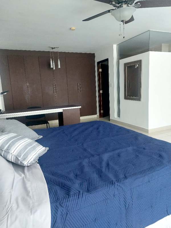 Bright open-plan living and dining loft space with panoramic windows in PH Vitroloft El Cangrejo Panama City