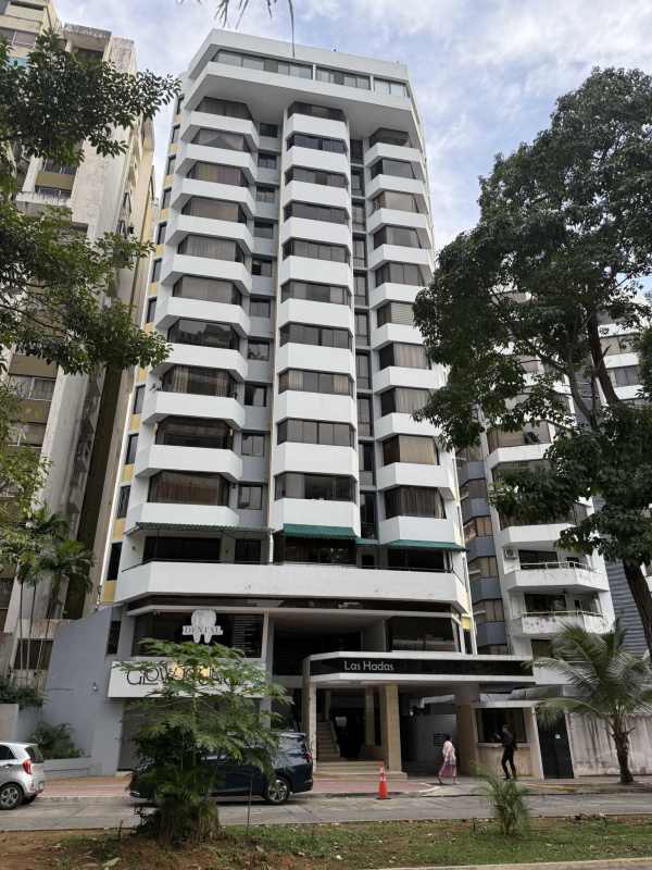 Open living and dining room with marble flooring bright windows PH Las Hadas Punta Paitilla Panama