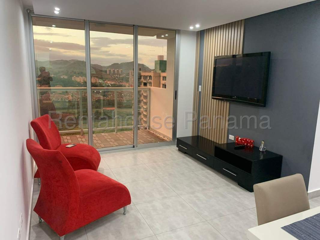 Spacious living room with AC, tile floor at Condado Gardens Condado del Rey Panama