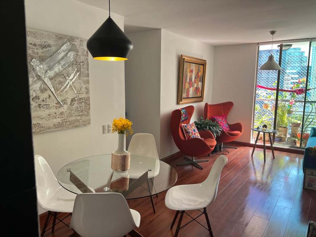 Oval-shaped rooftop swimming pool with skyline view at PH Pacifica Park in Panama City