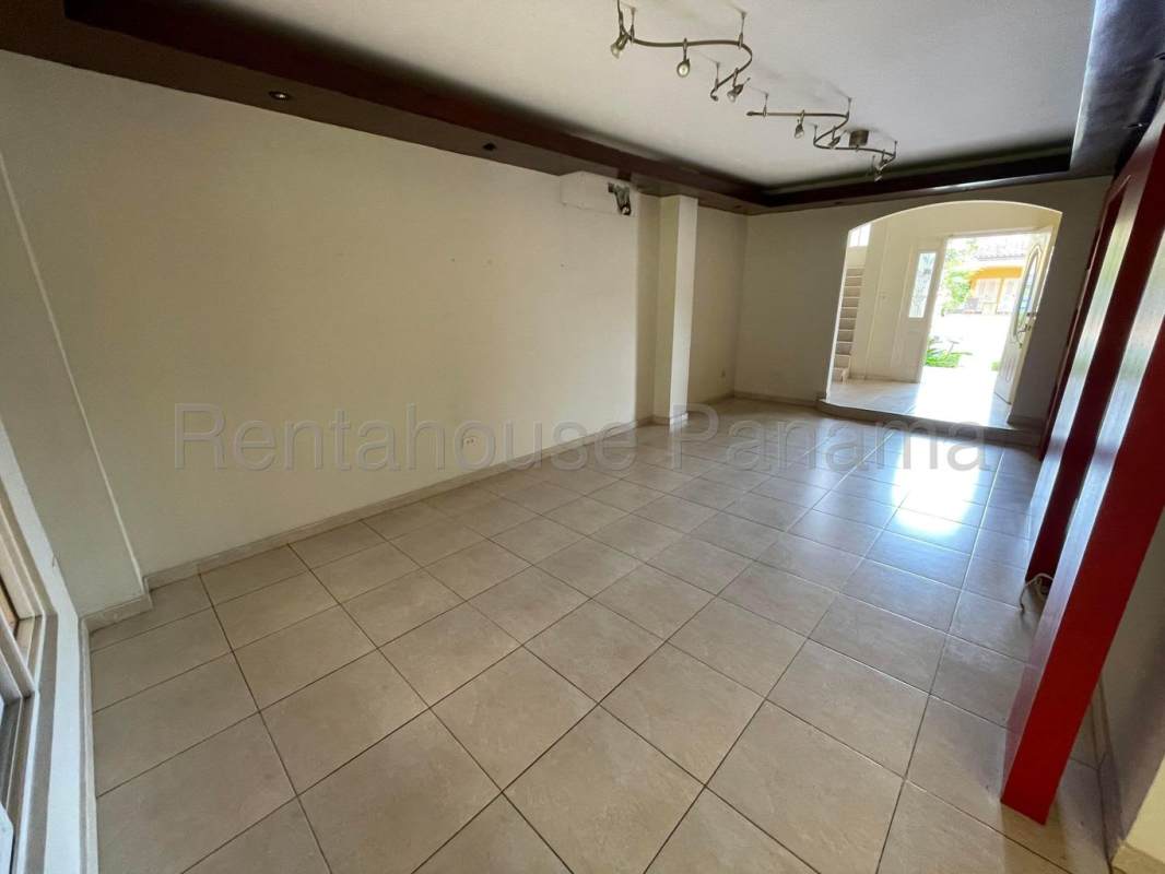 Master bedroom with private balcony and closet in Ancon duplex house Panama