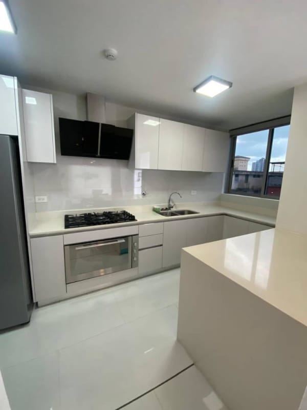 Shared coworking space with glass enclosed meeting room in PH Velure Panama City