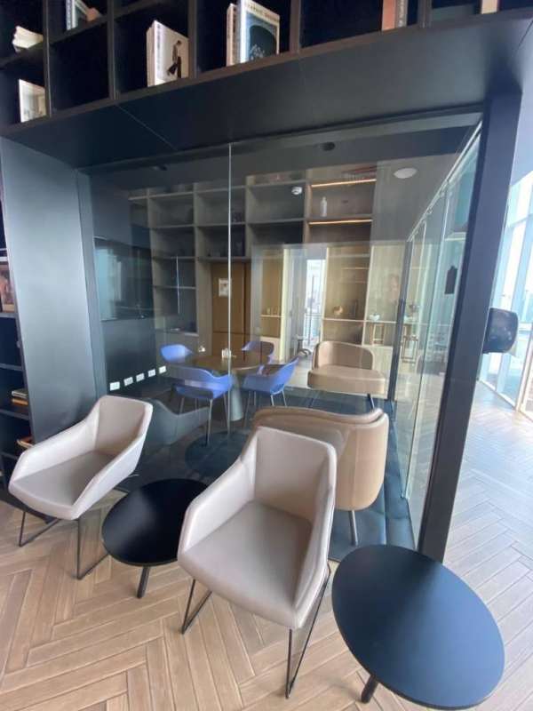 Modern kitchen design with appliances built-in white cabinetry PH Velure Panama apartment