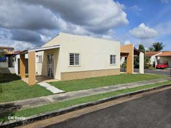 Covered terrace with tiled floor and backyard view Arboledas Costa Verde Panama