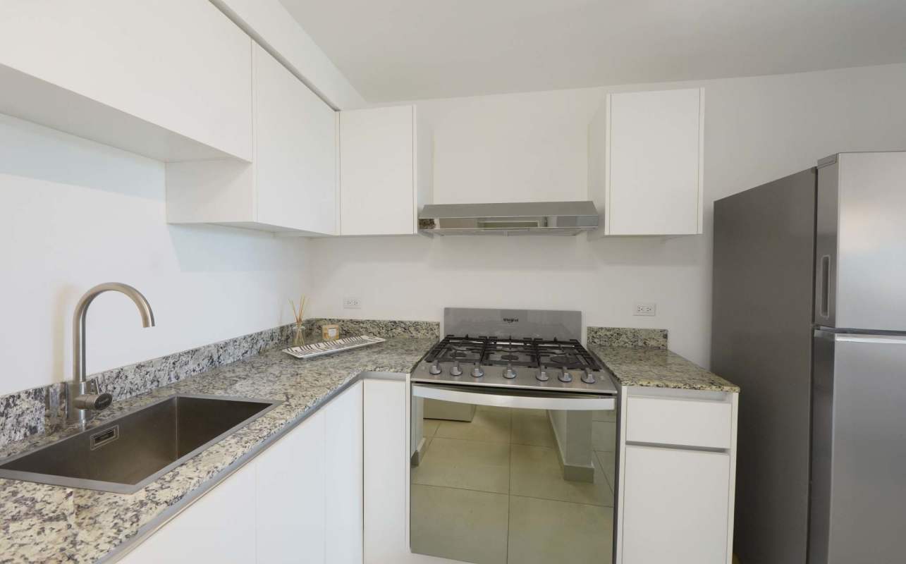 Modern kitchen granite countertops stainless appliances Panama Viejo Residences rental apartment