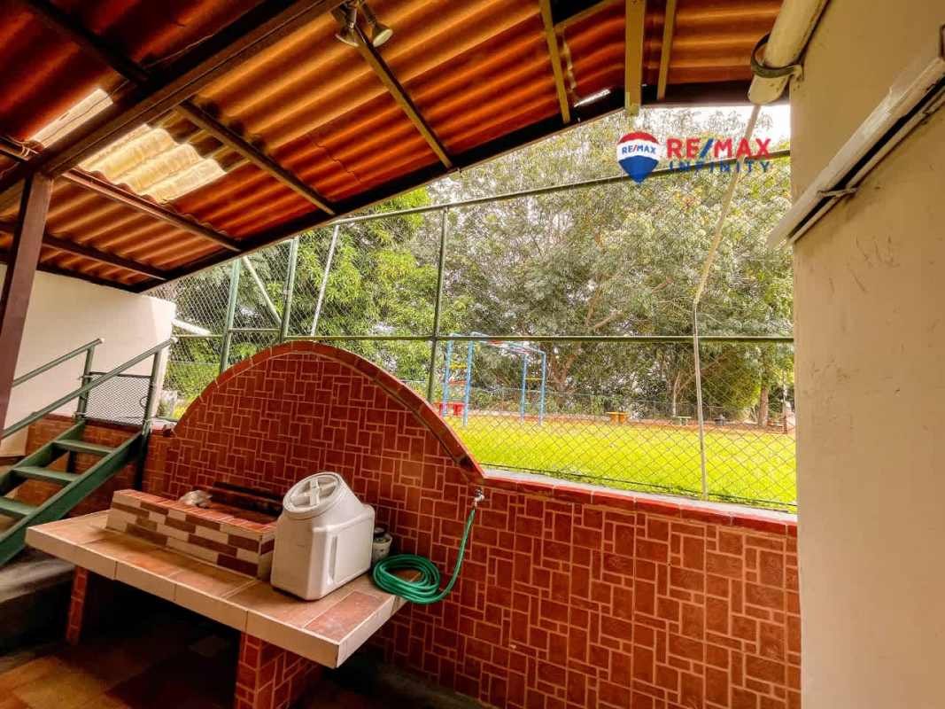 Spacious master bedroom with walk-in closet in Terrazas de Brisas del Golf house Panama