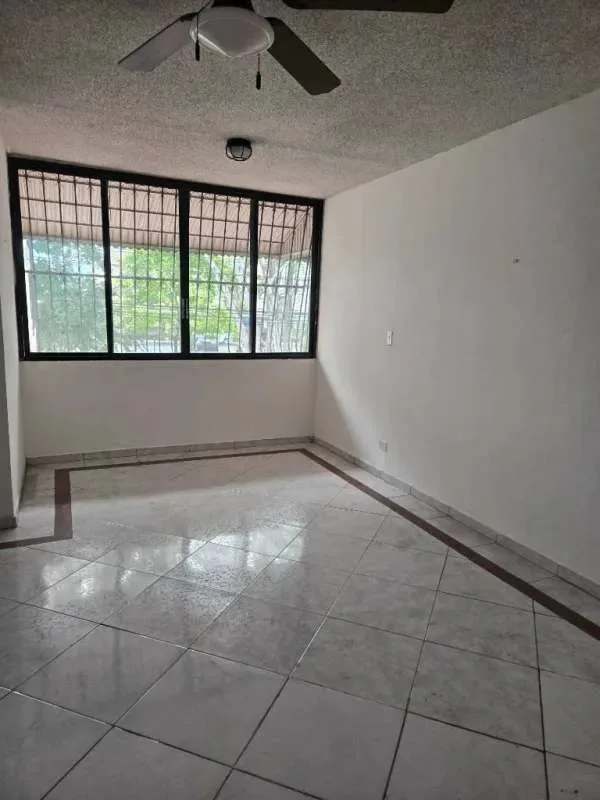 Kitchen with white cabinets, beige tile backsplash, minimalist style in PH La Alameda Villa de las Fuentes Panama