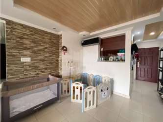 Spacious bedroom with windows in PH Silver City Colón Panama apartment for sale