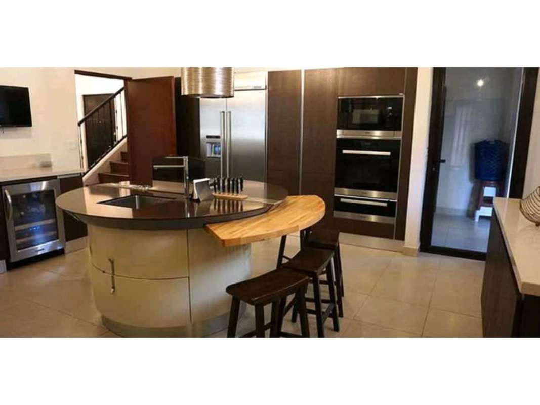Modern gourmet kitchen with island and stainless appliances Clayton Embassy Club Panama