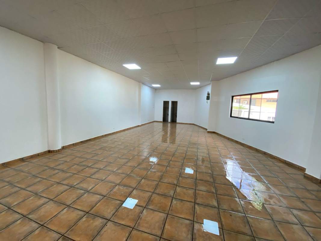 Empty commercial unit with tiled floors and bright lighting in PH Plaza Albrook Panama