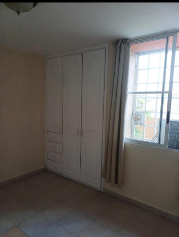 Bedroom with built-in wardrobe large window and AC PH Terrazas de San Francisco Panama