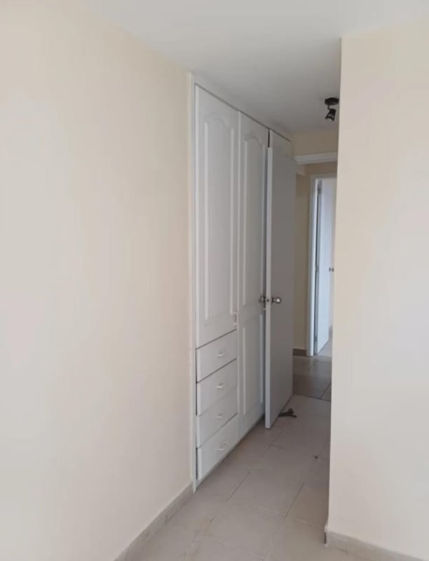 Hallway with beige walls closet and white doors PH Terrazas de San Francisco Panama City