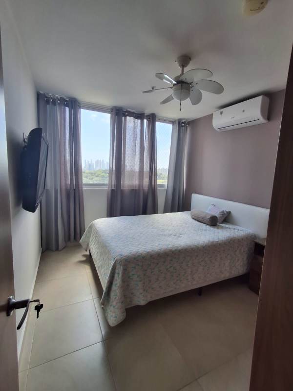 Spacious bedroom with large windows, air conditioning and neutral decor in PH Porto Alegre Villa Lucre Panama