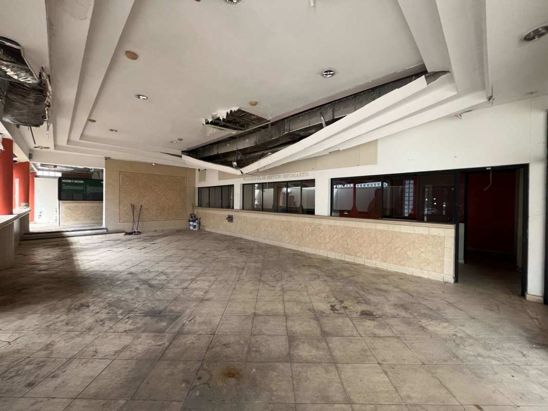 Large windows light-filled unfinished interior floor PH Cemento El Cangrejo Panama City