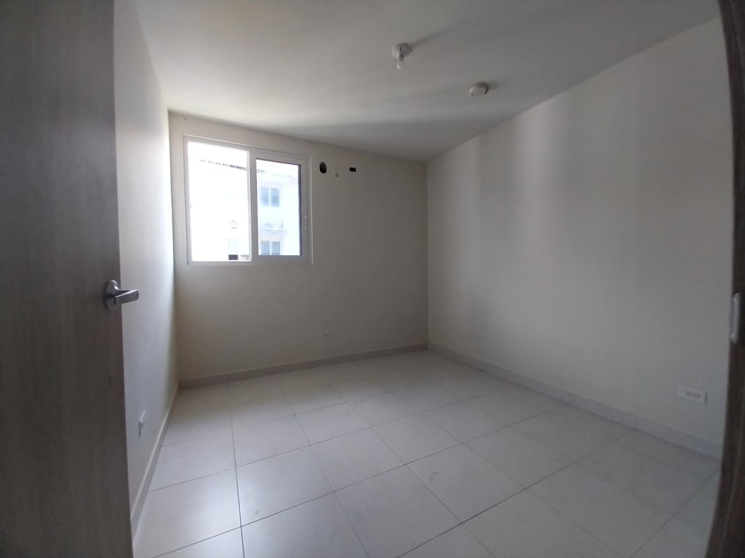 Bathroom featuring ceramic tiles, walk-in shower and vanity sink in Versalles II Panama