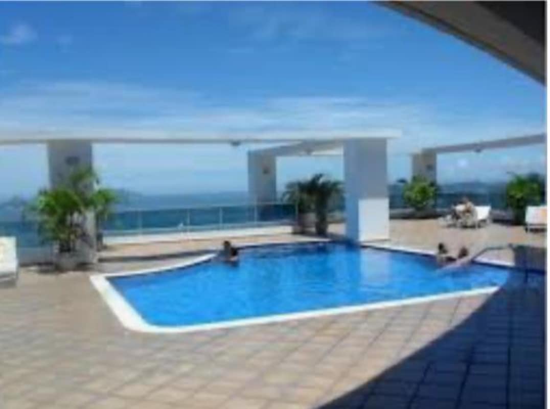 Private balcony overlooking Pacific Ocean and Panama City skyline in PH Grand Bay Tower Marbella