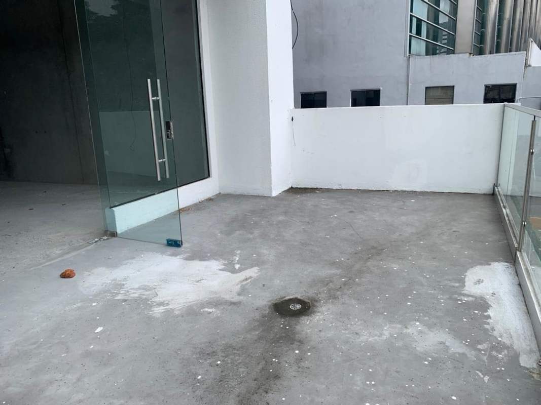 Concrete terrace balcony glass railing door in Worldwide Plaza Panama City