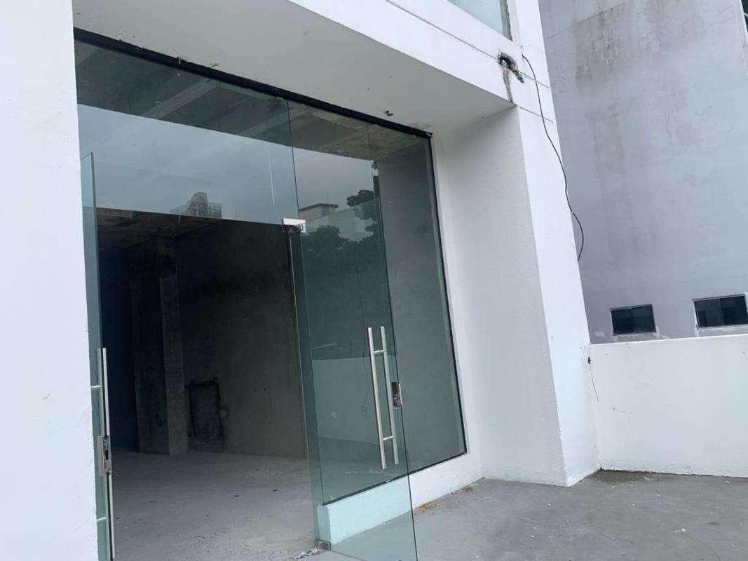 Commercial space exterior with glass doors and modern facade Worldwide Plaza Panama City