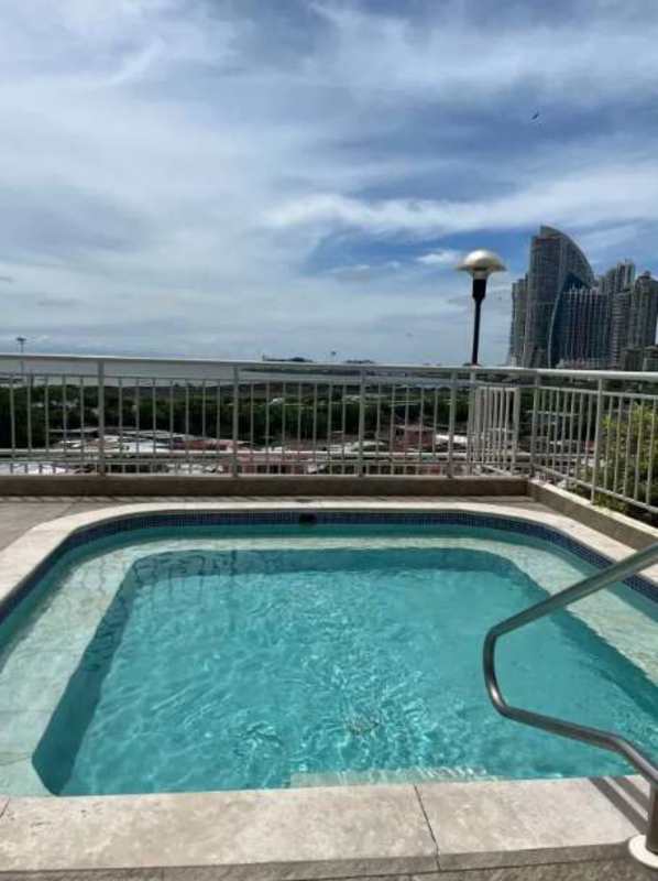 Modern kitchen with stove, oven, refrigerator and ample storage in PH San Francisco Bay Panama City