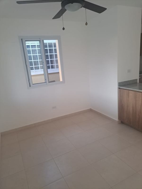 Bright open living dining space with ceiling fan at PH Palermo Nuevo Tocumen Panama