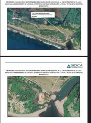 View of Río San Felix estuary edge and lush garden at Playa Las Lajas property in Panama